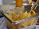 Papas a la francesa en carrito